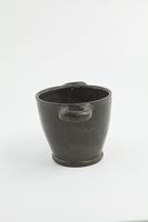 黒で塗られたスキュポス