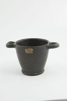 黒で塗られたスキュポス
